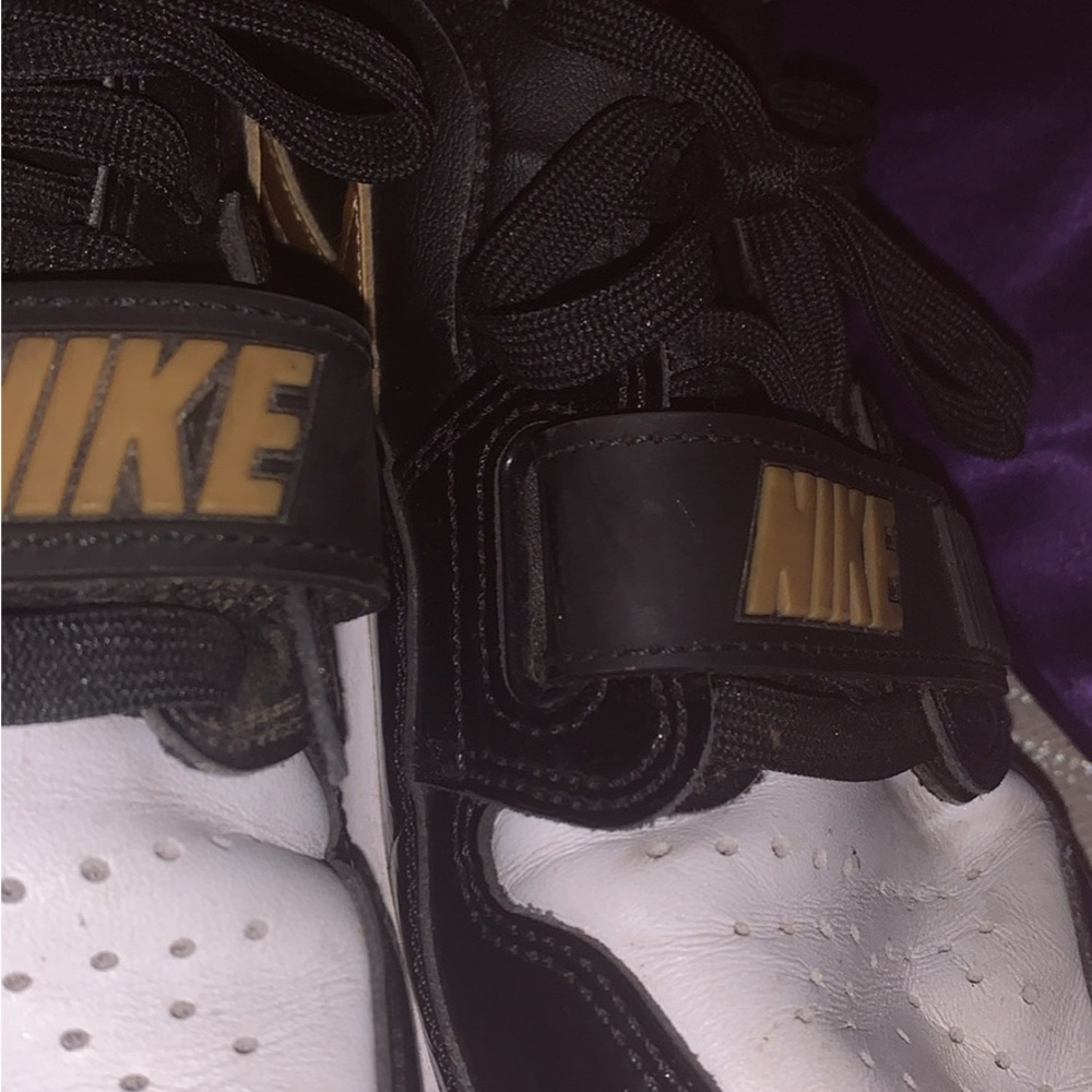 Nike Black and White Shoes with Gold Details